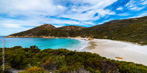 panorama of little beach in two peoples bay nature reserve in western australia; paradisiacal hidden beach surrounded by hills near the city of albany