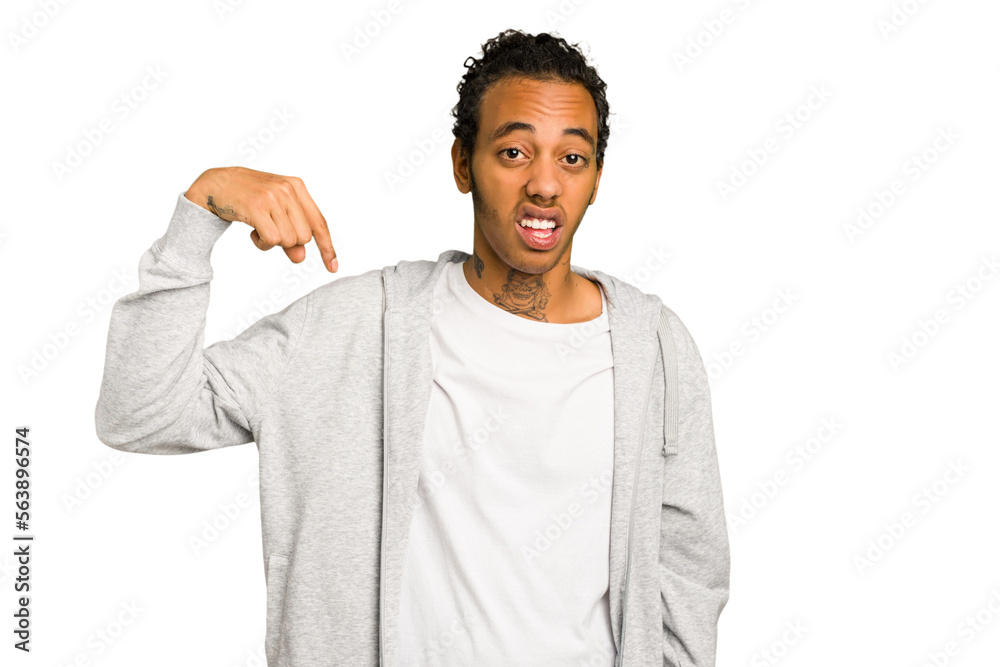 Young African American man isolated person pointing by hand to a shirt copy space, proud and confident Young African American man isolated person pointing by hand to a shirt copy space, proud and confident