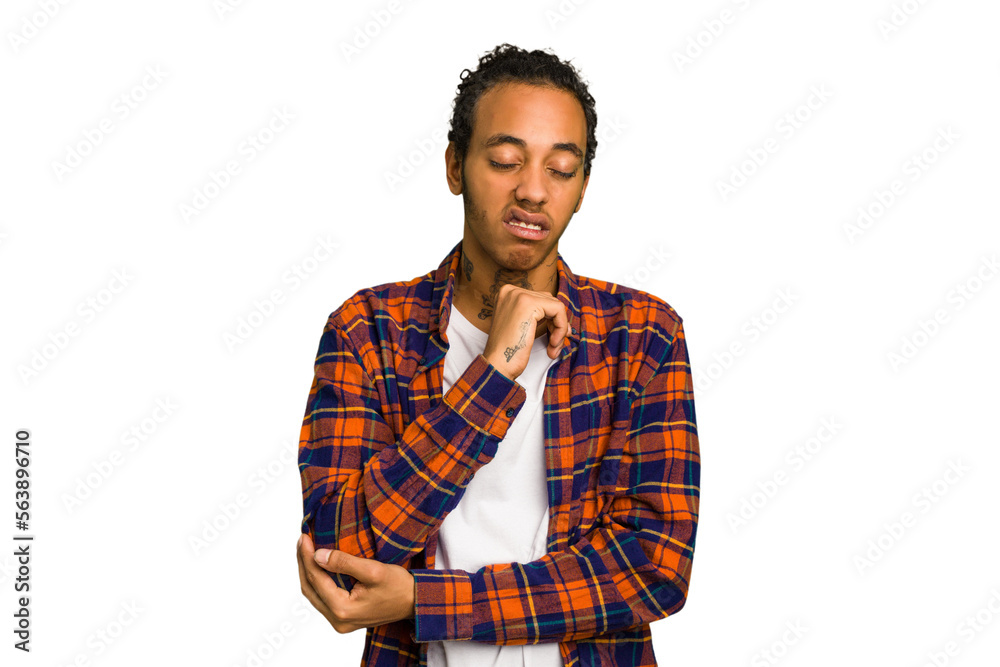 Young African American man isolated massaging elbow, suffering after a bad movement. Young African American man isolated massaging elbow, suffering after a bad movement.