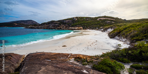 panorama of little hellfire bay in cape le grand national park, a paradisiacal beach with white sand and turquoise water surrounded by mighty hills