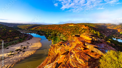 panorama of murchison river gorge in kalbarri national park during sunrise, western australia; desert landscape with red rocks and a river in a deep gorge near nature's window photo