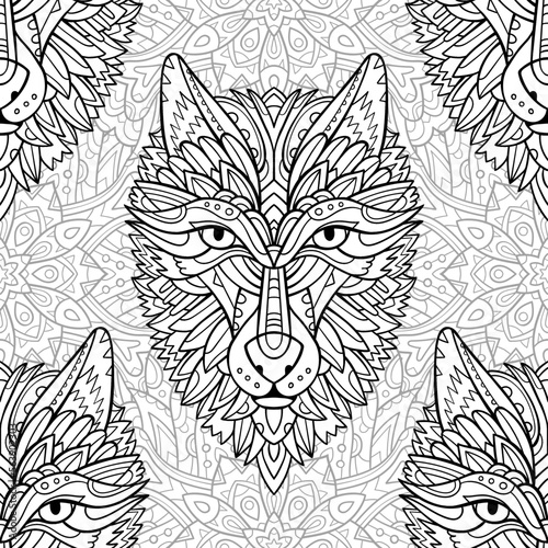 Black and white ornamental seamless pattern with wolf head and mandala. Decorative fabric design.