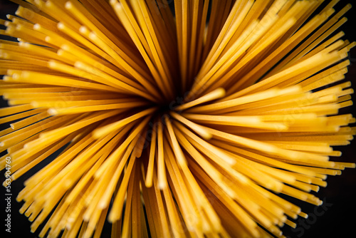 A bunch of dry pasta on the table. 