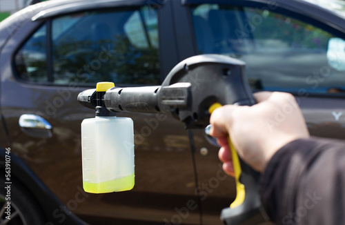 Nozzle foam generator for a sink of a high pressure. car chemicals, shampoo concentrate. Car care. copy space for text