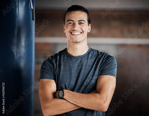 Man, smile portrait and fitness in gym for exercise workout, boxing training and sports wellness mindset. Happy athlete, personal trainer success and relax happiness for cardio lifestyle in club