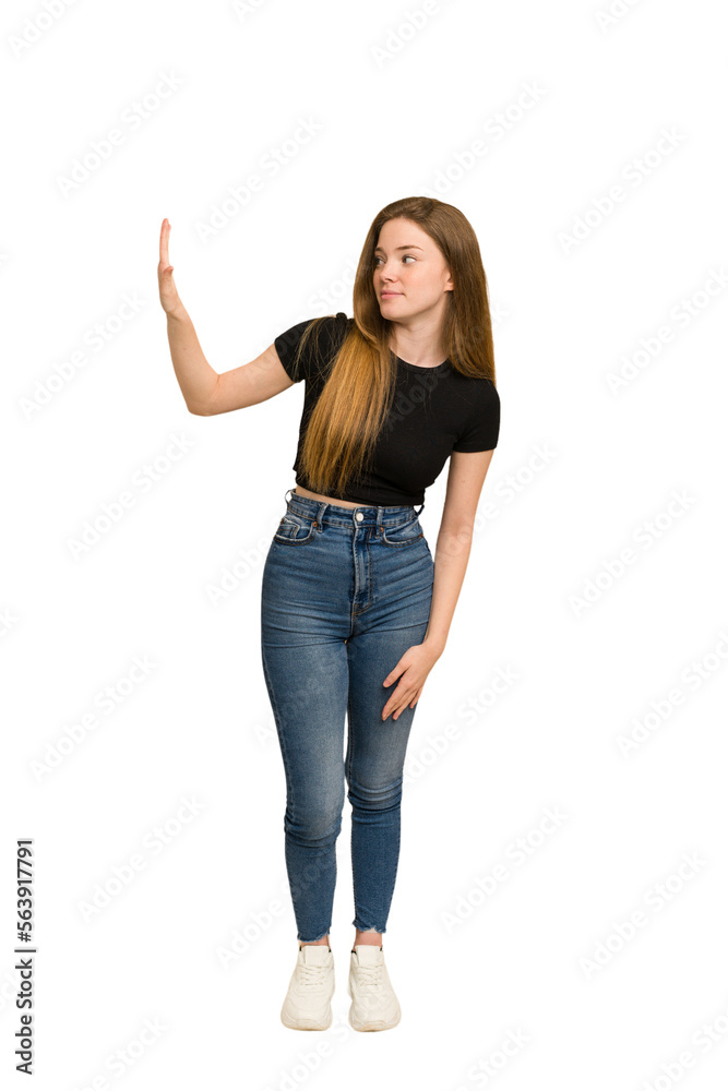 Young redhead woman pushing with hands cut out isolated Young redhead woman pushing with hands cut out isolated