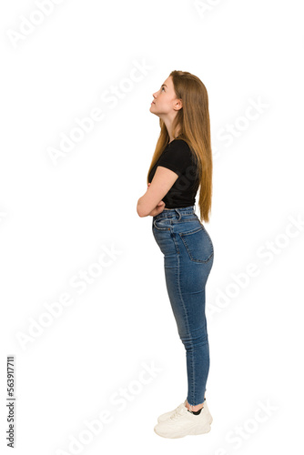 Young redhead woman with freckles standing full body cut out isolated