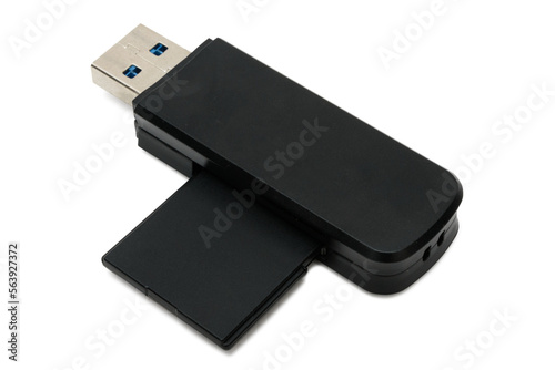 Cartão de memória inserido em um leitor de cartão USB. Equipamento usado para transferir dados do cartão para computadores e outros aparelhos eletrônicos. photo