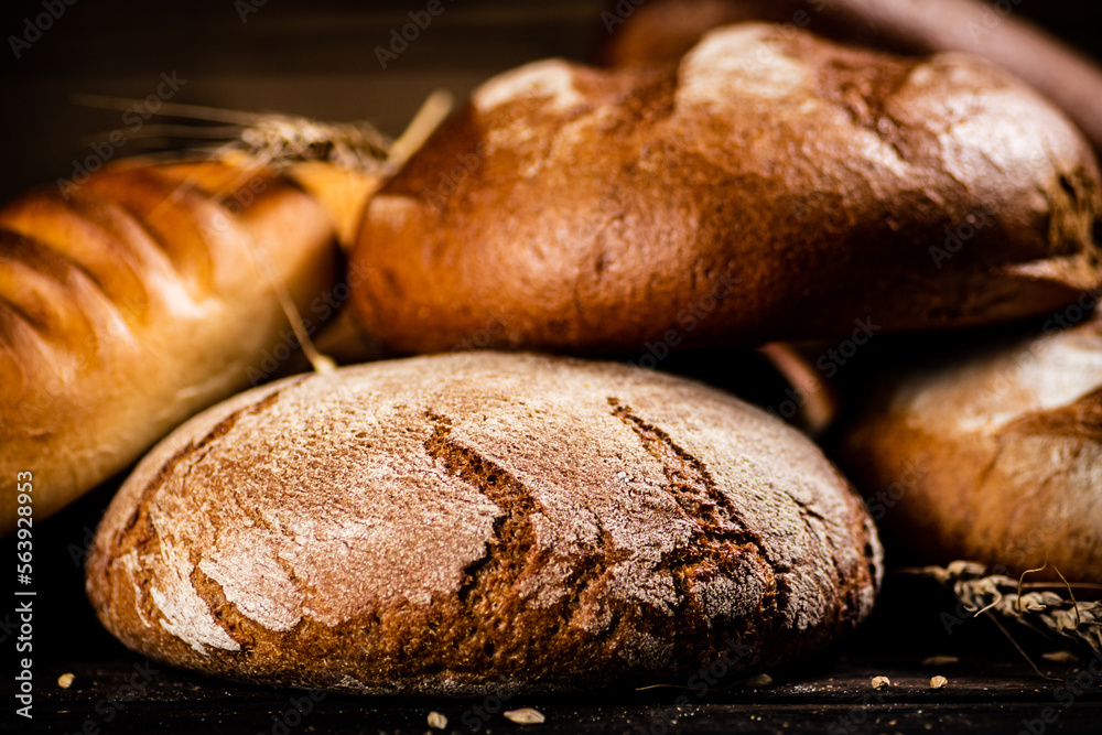 Different types of fresh crispy bread. 