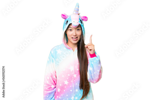 Young Asian woman with unicorn pajamas over isolated chroma key background thinking an idea pointing the finger up