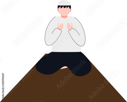 a man wearing a white koko shirt and black trousers equipped with a cap is praying after completing the prayer service
