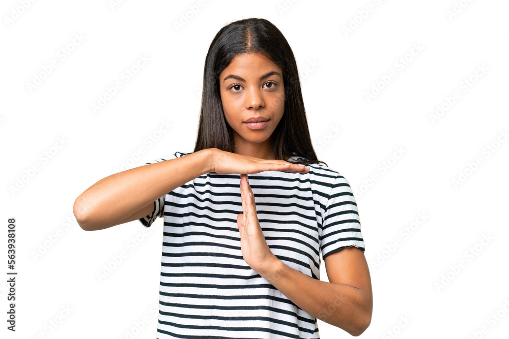 Young African american woman over isolated background making time out gesture Young African american woman over isolated background making time out gesture