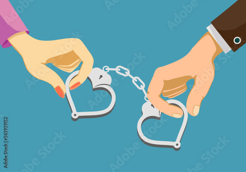 Couple man and woman hold handcuffs
