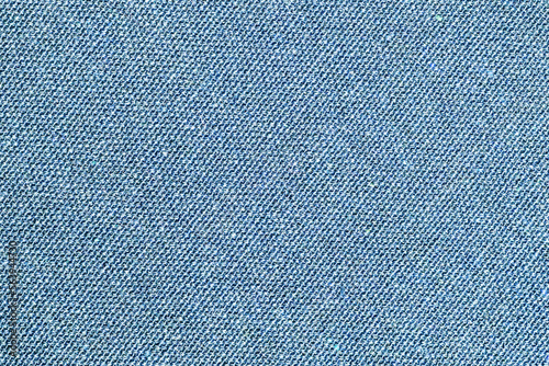 Blue jeans texture. Fabric structure background. Clothing textile pattern. Closeup fashion material. Closeup textile background. Apparel clothes. Casual wear. Knit pattern. Blue fabric texture.