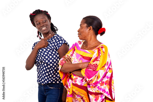 young girl talking gesturing finger near her mother.