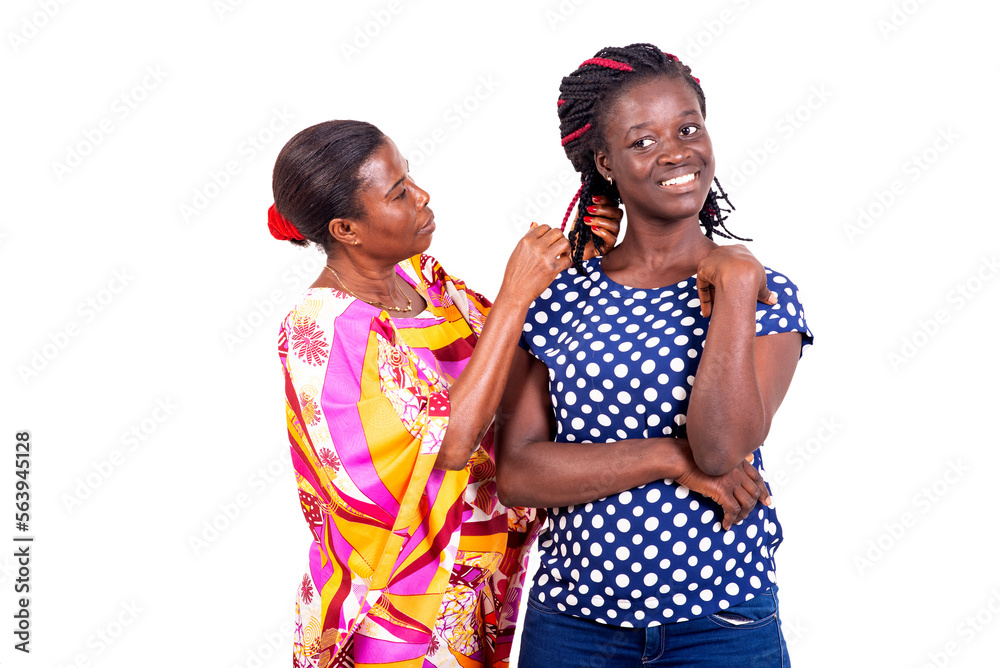 woman looking at her friend's braided hair. woman looking at her friend's braided hair.