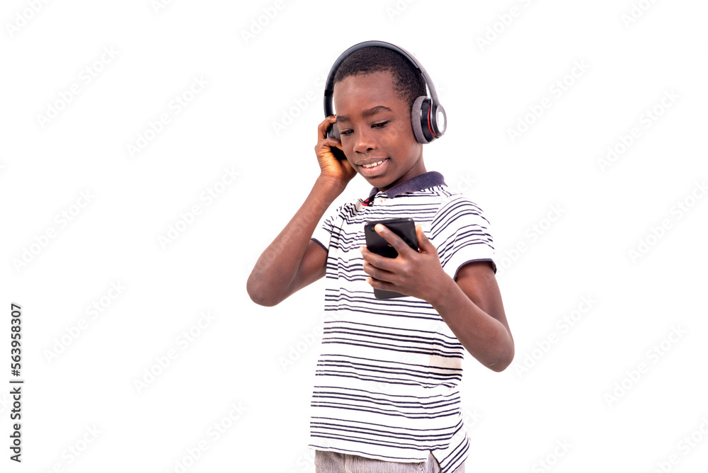 portrait of a young boy with headsets and cellphone, smiling. portrait of a young boy with headsets and cellphone, smiling.
