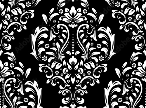 Wallpaper in the style of Baroque. Seamless vector background. White and black floral ornament. Graphic pattern for fabric, wallpaper, packaging. Ornate Damask flower ornament
