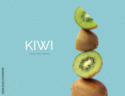 Creative layout made of kiwi on the blue background. Flat lay. Food concept. Macro  concept.