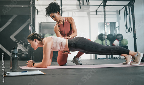 Fototapeta Naklejka Na Ścianę i Meble -  Fitness, plank or personal trainer at gym with woman for training, exercise or workout at health club. Women, focus or healthy sports athlete exercising with coach for progress, support or motivation