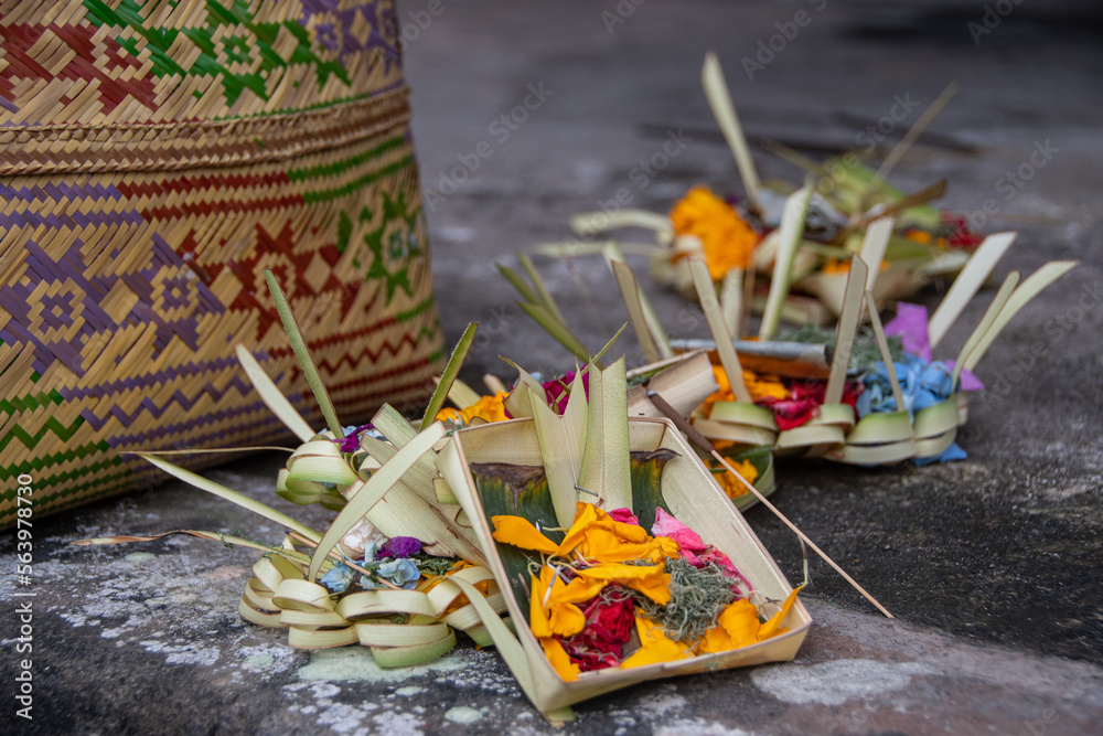 The closeup view of a Hindu offering in front of a temple