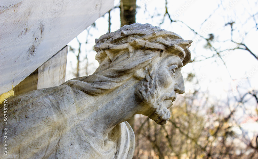 Jesus Christ in the sunlight. Suffering on the cross