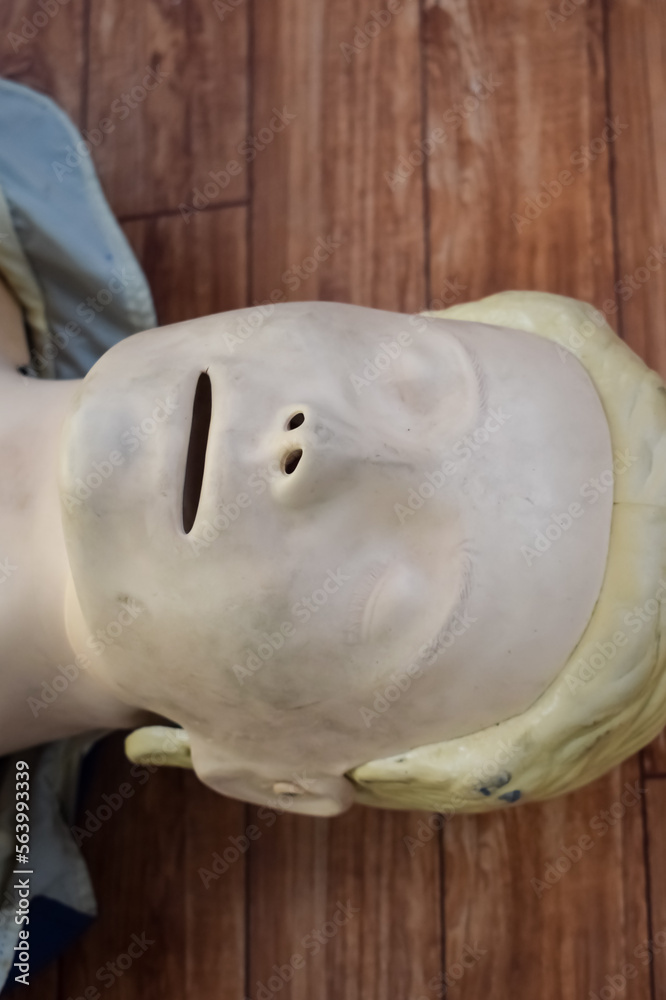 Human dummy lies on the floor during first Aid Training