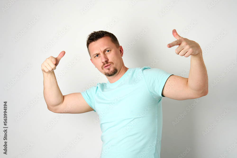 Portrait of young man boy showing Yo gesture with hands Portrait of young man boy showing Yo gesture with hands