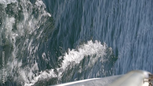 Wallpaper Mural The bow of the white yacht cuts the waves. Slow motion Torontodigital.ca