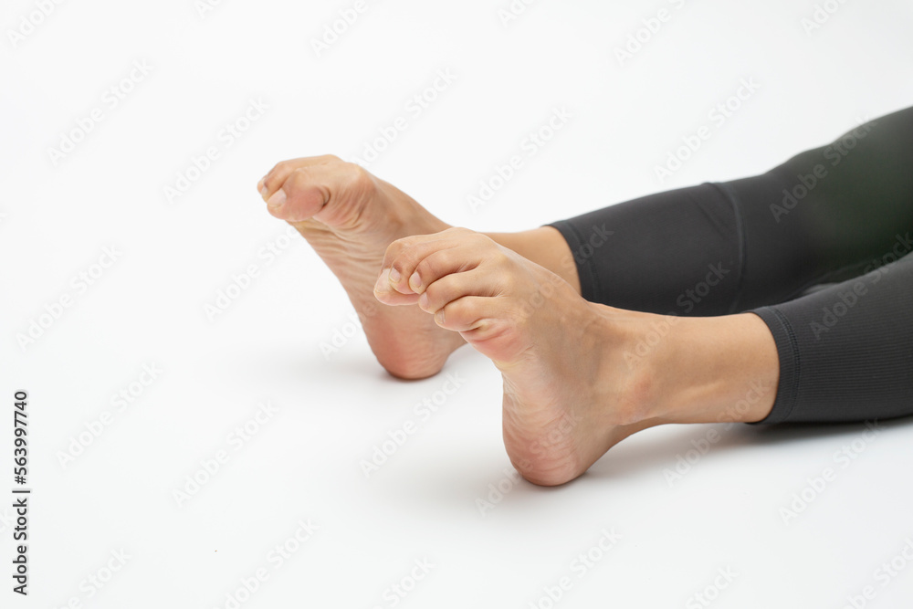 Toe bend downward. Foot exercises for flexibility and mobility Stock Photo