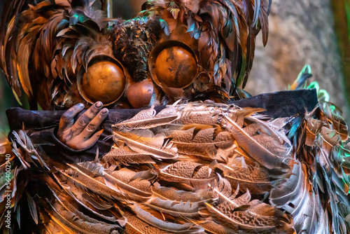 Mayan warriors at Xcaret performing a pre-Hispanic Mayan dance called the dance of the owl in the jungle of the Mayan Riviera in an ancient Mayan civilization village. photo