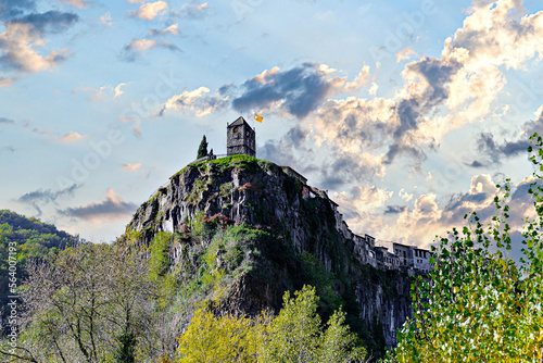 Views of the town of Castellfollit de la Roca, settled on a basaltic cliff in the region of La Garrotxa, Girona, Catalonia photo