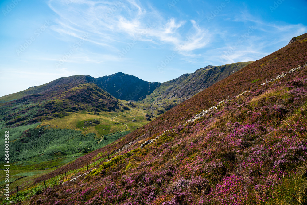 Obraz premium Climbing and lake view on cadair idris hill in wales 2022.