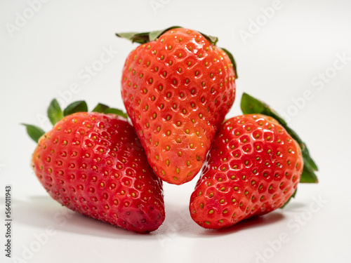 Ripe strawberries on a white background. Strawberries close up.