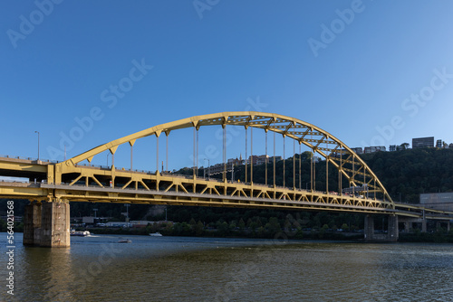 Fort Pitt Bridge and Monongahela River in Pittsburgh in Pennsylvania. Sunset Sky and Light.