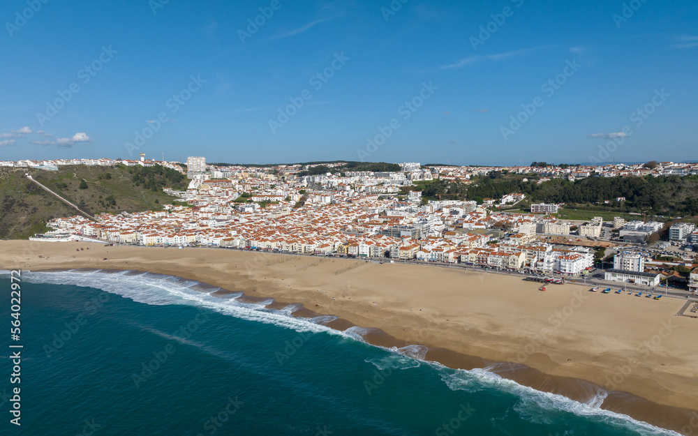 Nazare Town in Portugal. Beach and Cityscape. Drone Point of view.