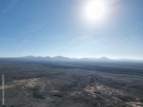 Views across the black lava volcano field of Jabal Qidr in the Harrat Khaybar region, north west Saudi Arabia photo