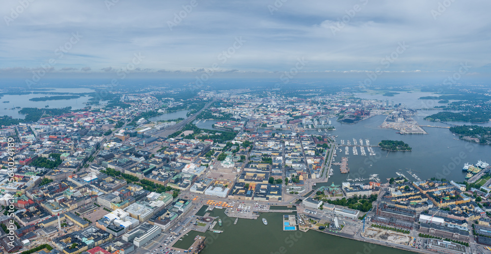 Helsinki Downtown Cityscape, Finland. Cathedral Square, Market Square, Sky Wheel, Port, Harbor in Background. Drone Point of View