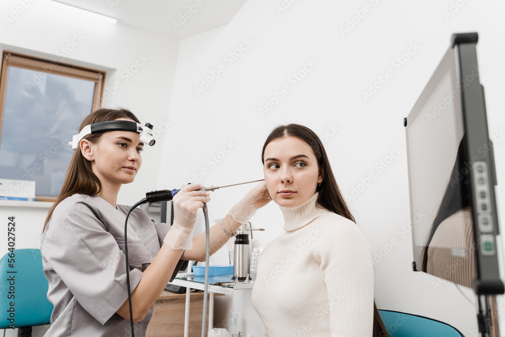 Ear endoscopy. Ears endoscopy procedure with endoscope. ENT doctor
