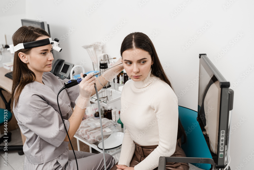 Ear endoscopy. Ears endoscopy procedure with endoscope. ENT doctor