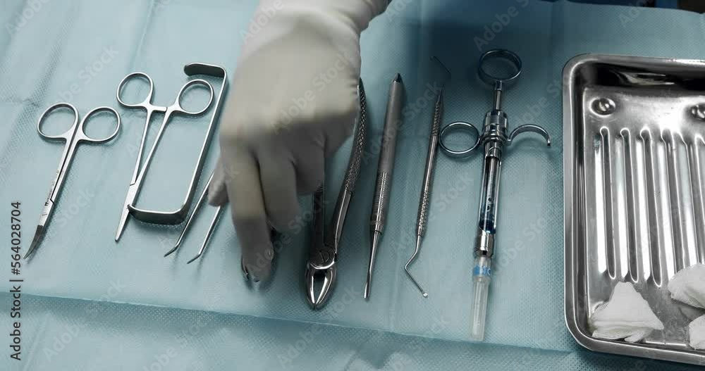 Sterile instruments at the dental clinic. tools for tooth treatment. instruments for examining teeth on the dentist's table. Sterile instruments in a modern dental clinic for tooth extraction