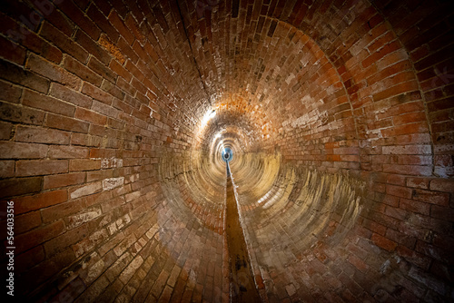 underground sewerage, tunnel of an old brick historical sewer