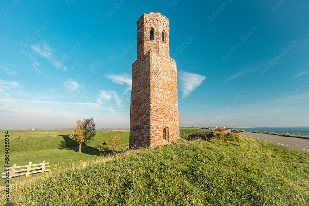 Plompe Toren. An Old tower from the 14th century, in the dutch place Burgh-Haamstede. Zeeland, The Netherlands.