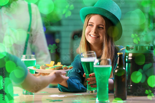 Happy young woman with glas...