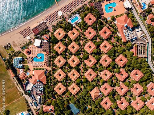 aerial view of a luxurious tropical hotel resort  showcasing the grandeur of the hotel complex and its surrounding tropical landscape