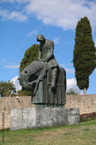 Bronze statue of Saint Francis in front of the Basilica of San Francesco in Assisi, Umbria Italy