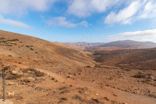 Desert landscape with mountains terraine. Caldera of an ancient volcano.