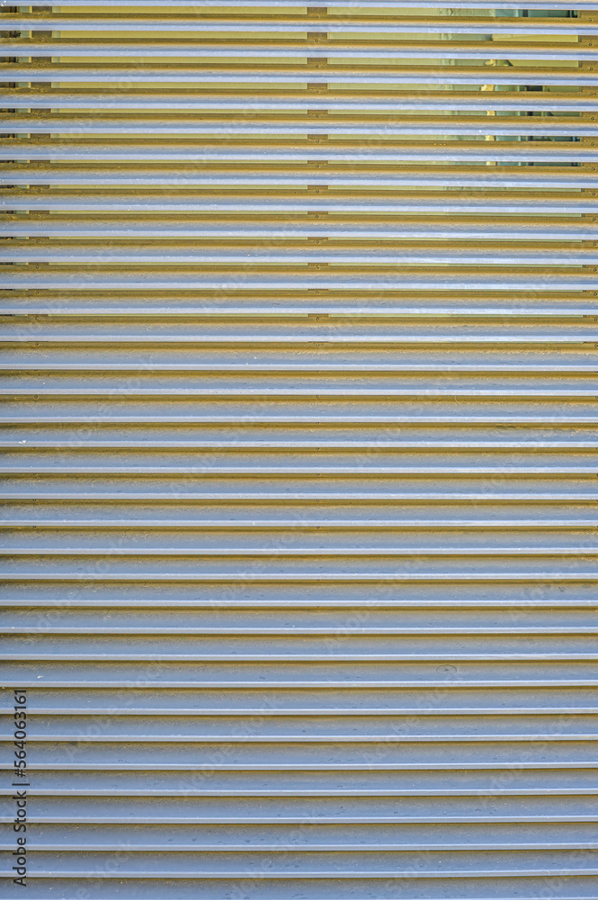 Obraz premium Metal ribbed sheet. abstract vertical textural linear background.