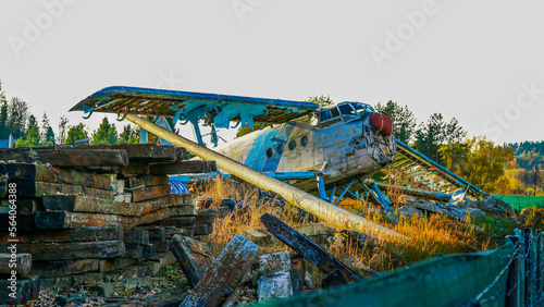 Wrecked airplane on the junk yard photo