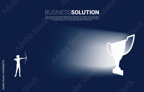 Businessman in suit shoot the arrow to exit door shape trophy. Business Concept of route to winner and champion